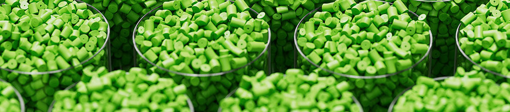 Grid of glasses filled with green plastic polypropylene granules, masterbatch polymer grain, HDPE or PVC resin pellets.