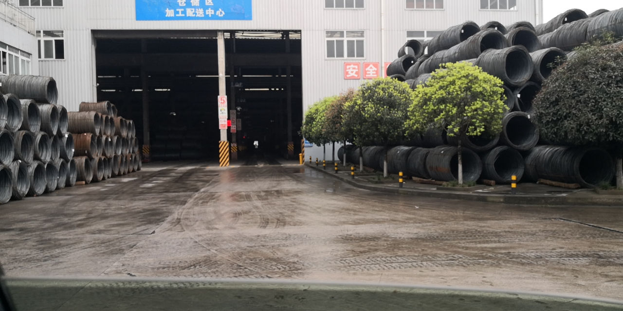 Steel overflowing at warehouse in China March 2020