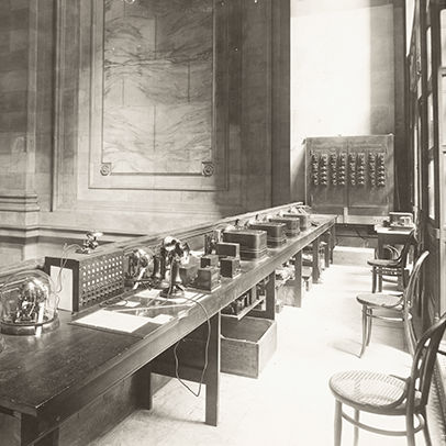 An empty room with a table and chairs